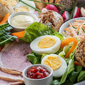 A salad platter with an array of penny loaves