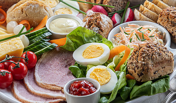 A salad platter with an array of penny loaves