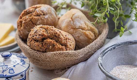 A bread basket with a selection of penny loaves