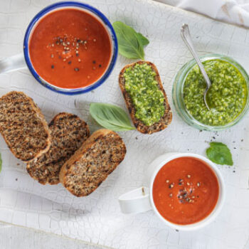Roasted pepper soup with penny loaves spread with pesto