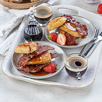 French Toast made with white Penny Loaves on a tray with coffee